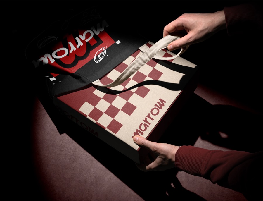 Hands holding branded print